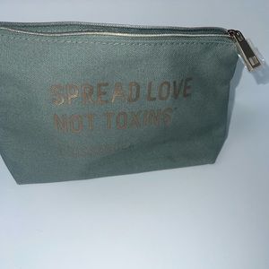 Biossance cosmetic bag